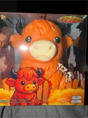 Squishy Orange Squeezable highland cow